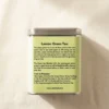 Lemon Green Tea 100gm Tin Box With Side view of tin box with Description