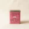 Strawberry Tea 100gm Tin Box With Side view of tin box with Ingredients and Nutritional Table